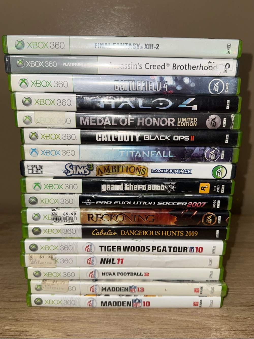 XBOX 360 Game Case Bundle of 17. 6 Free random games.